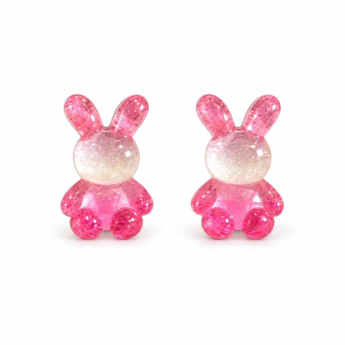 Boucles d’oreilles lapin rose blanc rose sur fond blanc